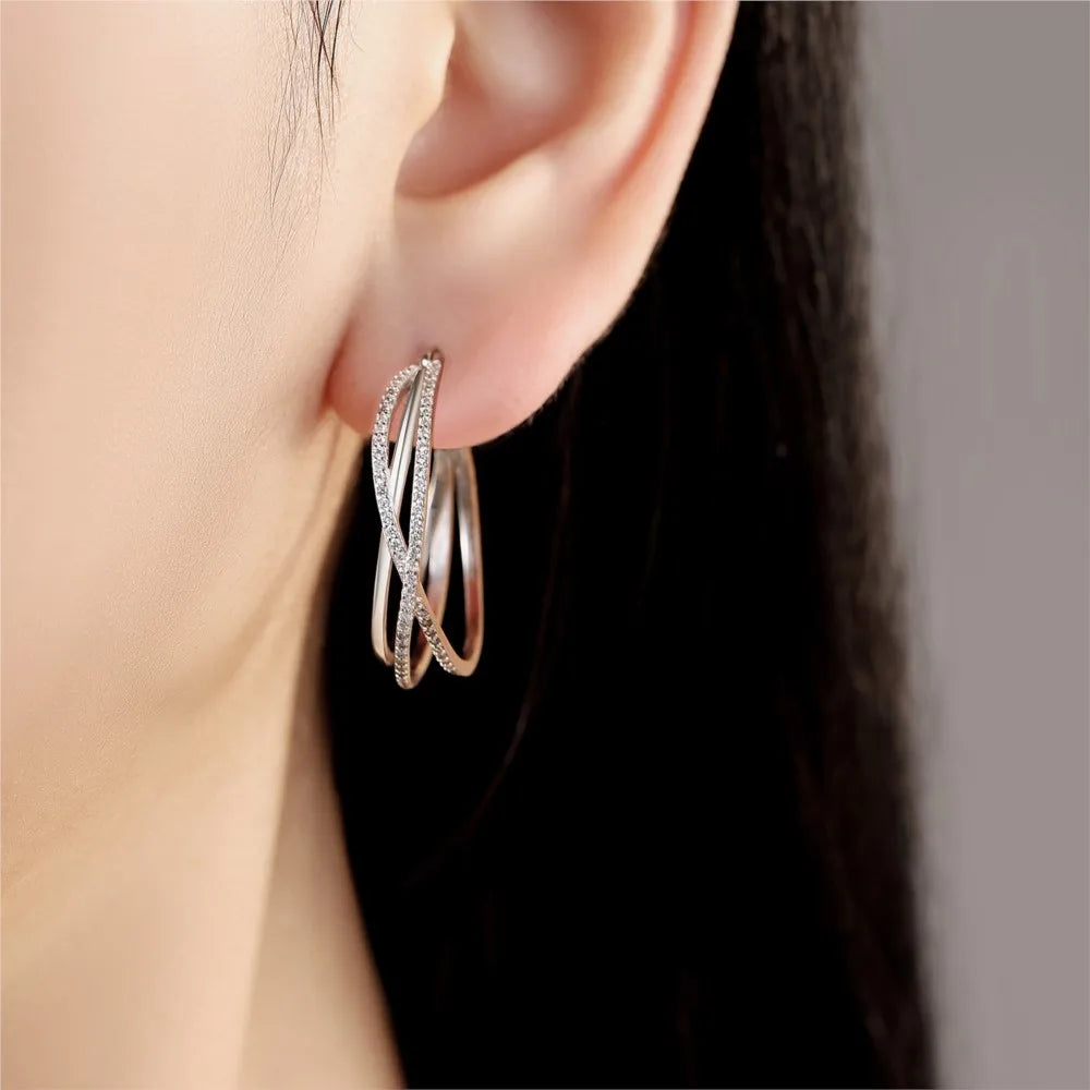 Elegant Twisted Hoop Earrings with Pavé Zirconia – 925 Sterling Silver
